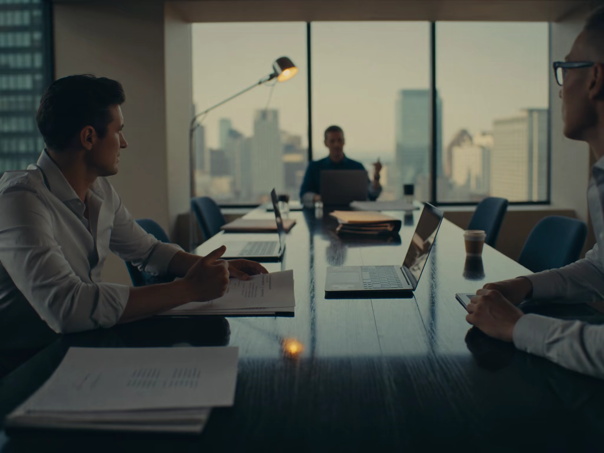 Advisors in a boardroom reviewing risk and insurance strategy